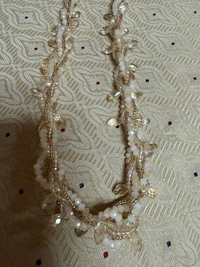 Citrine and rhinestone necklace in peach and rose gold.